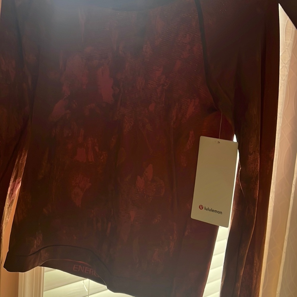 Lululemon swiftly tech pink dye never worn  size 6 race legnth